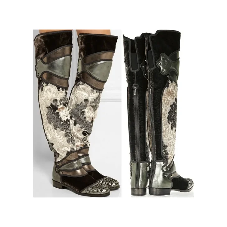 Pair of metallic silver leather Dolce & Gabbana over-the-knee boots designed to look like medieval knight armor